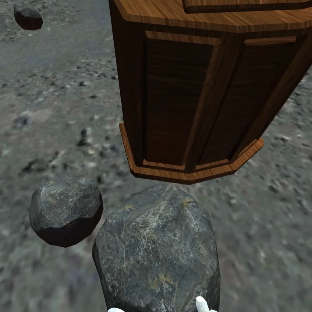 A virtual hand holds a moon rock beside the lectern