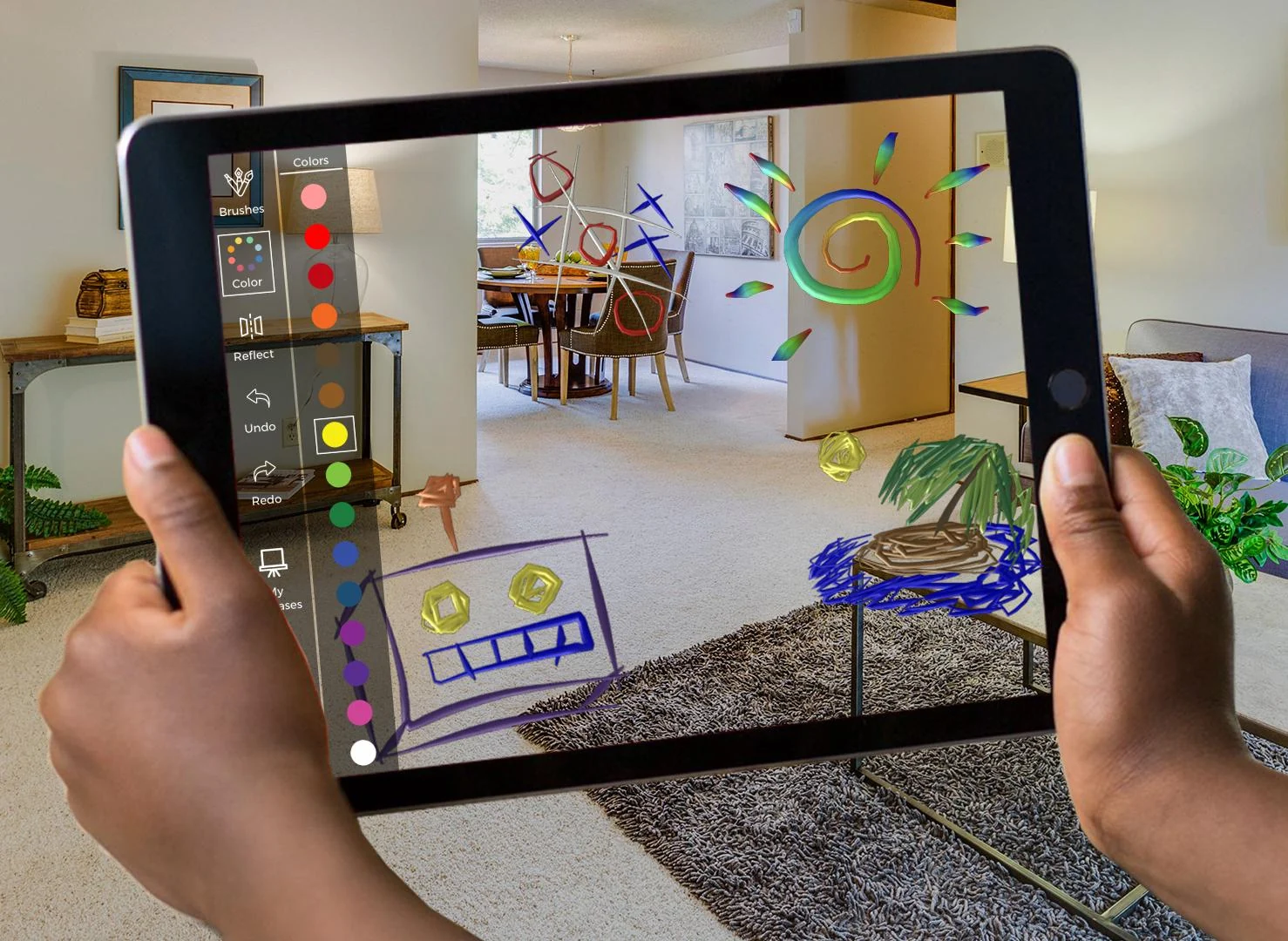 Drawlight concept image showing augmented drawings through a tablet