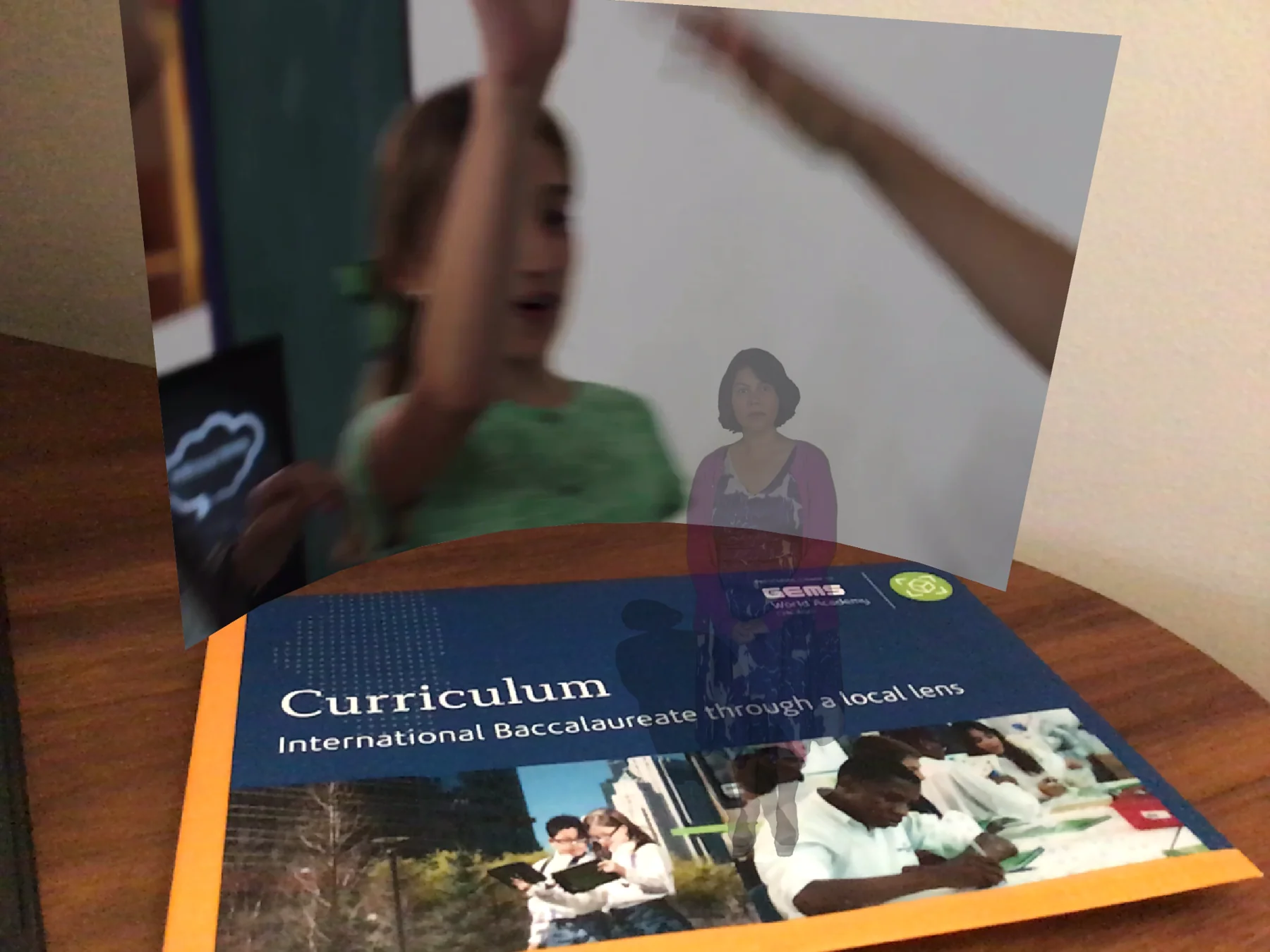 GEMS postcard with an augmented student video